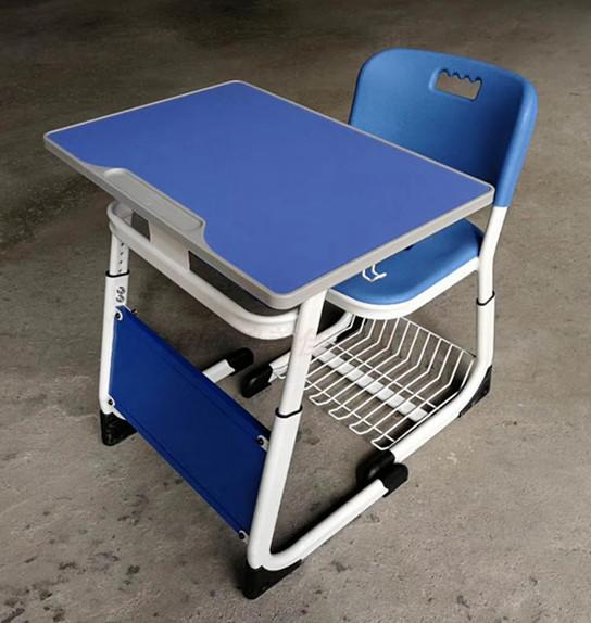 新款**塑钢小学生课桌椅，广东鸿美佳厂家供应课桌椅